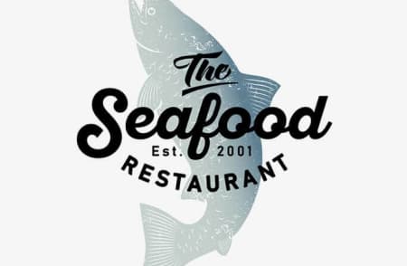 Логотип в виде рыбы с название ресторана Seafood